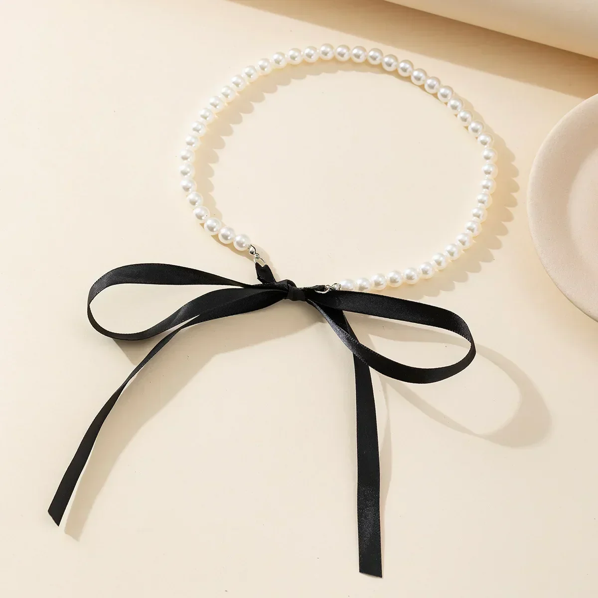 Choker z kokardką i perełkami - Image 3